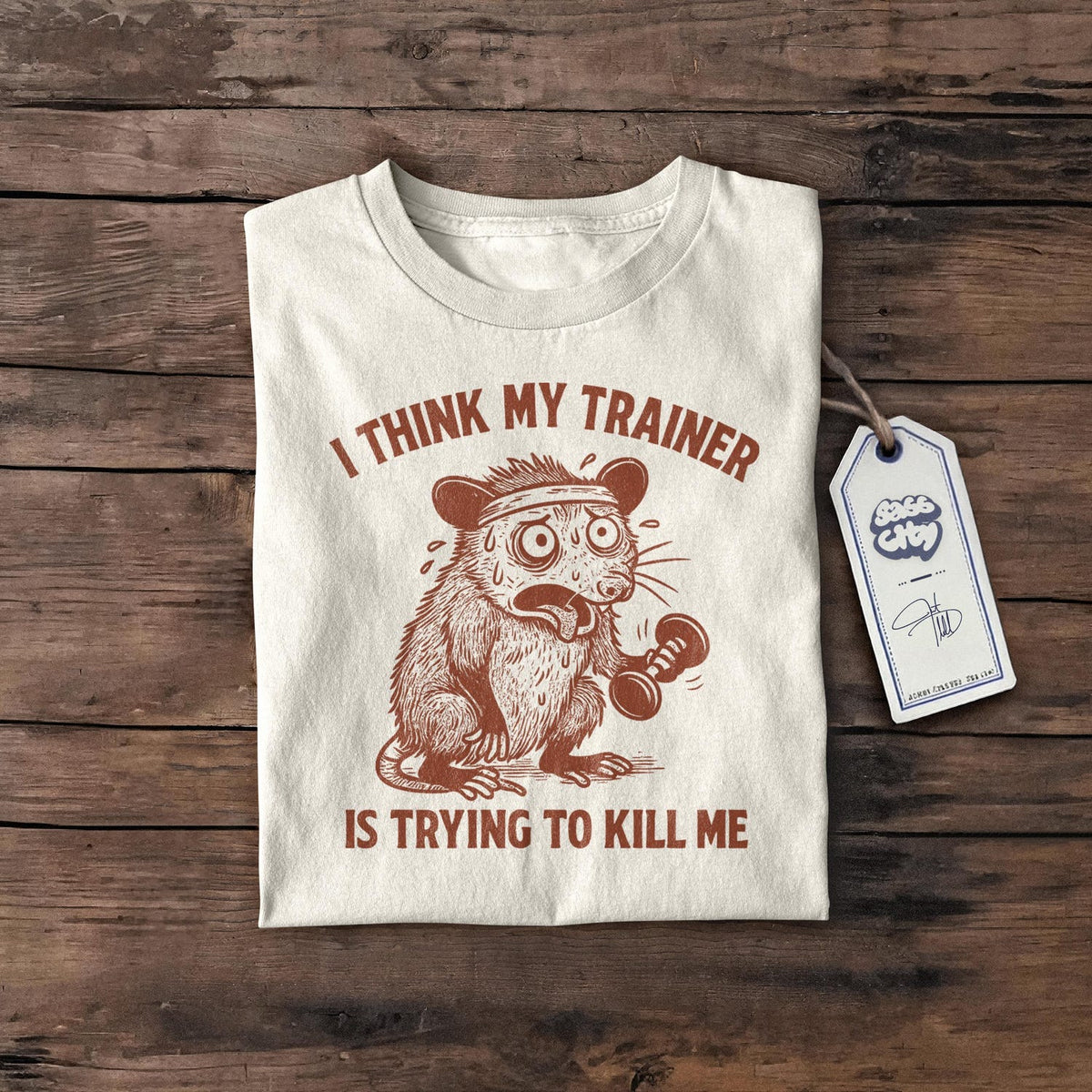 I Think My Trainer Is Trying to Kill Me Shirt, Funny Gym T-Shirt, Humorous Workout Shirt, Fitness Joke Tee, Gift for Gym Lovers, Girl Shirt